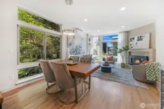 Fantastic oak hardwood flooring throughout the main level.  Note the mini-split for warming and cooling the room as needed.