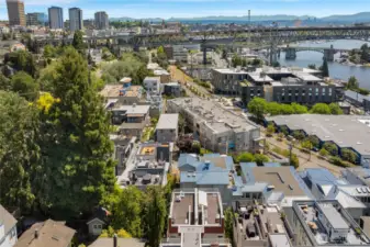 Looking east to the mountains, the Ship Canal bridge, and the University District.