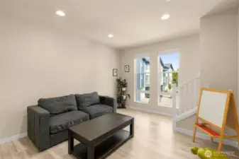 Soaked in natural light from generous-size windows, the home feels bright and alive from morning to night.