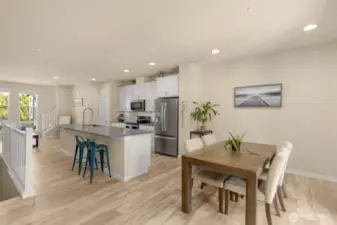 Dining room sits just off the kitchen, perfectly placed for easy meals and effortless entertaining, with seamless access to the patio for indoor-outdoor gatherings.