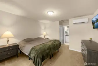 Spacious top floor primary suite complete with walk-in closet, sitting area and en-suite bath