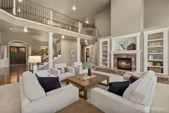 Gas fireplace surrounded by built-in shelves.