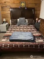 Primary bedroom (different bedcover)