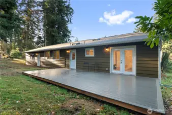 Massive back deck to enjoy your sprawling, park like 1.5 acres.