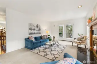 The long art or media walls or room for shelving invite this space to serve many uses like a library or main floor office. The kitchen great room and large rec room on the lower level provide alternative spaces too.