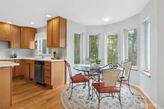 The large bay window welcomes a kitchen eating space or cozy conversation/reading nook. Imagine your favorite touches here.