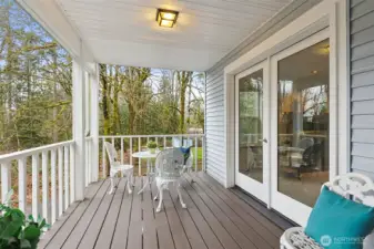 The back covered porch off the kitchen/great room and living room invites winter, spring, summer or fall activities and grilling. A large space for dinning and dreaming.