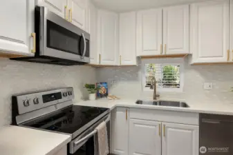 Custom Tile, Designer Hardware, White Cabinets