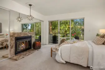 Primary Bedroom Featuring a Gas Fireplace