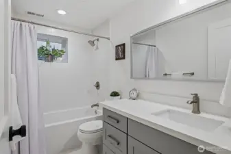 Full bath adjacent to bedroom offers the perfect guest suite area