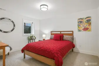 This comfortable bedroom has a big closet .