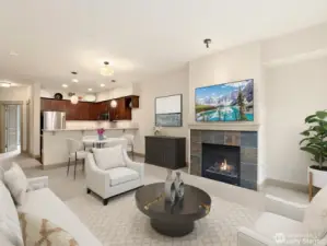Virtually staged - Another angle of the Dining and Living room with gas fireplace and the Kitchen beyond.