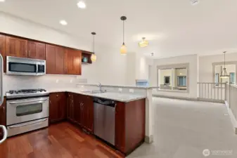 Kitchen, dining, and living room.