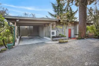 This home is much more spacious than it appears from the outside entry.  With 2 bedrooms, 2 baths, a kitchen, a fireplace, and a good-sized main living area on both floors.