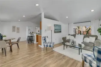 Enter to vaulted ceilings and light filled interiors