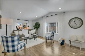 You'll find large windows throughout this home allowing natural light to flood the space