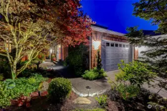 The garden lighting is not only beautiful, but a safety feature lighting the sidewalk entry.