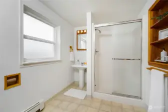 The ensuite bath features a walk-in shower.