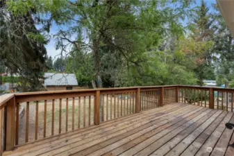 Large back deck that overlooks huge back yard has recently been pressure washed.