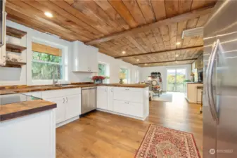 Open living with original 1930 wood ceiling.