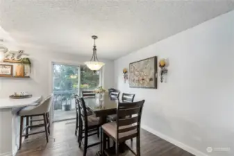 The dining area adds great space for dinner parties or entertaining between the living spaces.