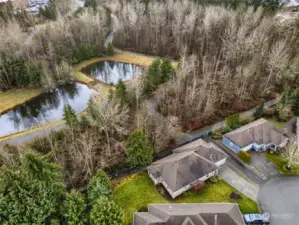 Walking trails visible behind home.