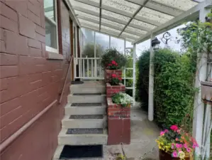 Entering up the stairs to the kitchen.