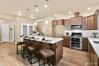 Home is under construction. Photos are of a previously built home from the same community with similar finishes that are staged. Builder reserves the right to change features, plans, prices & specifications without notice. Features vary by plan. Buyer to verify square footage.