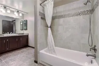 Main bath off hallway has been beautifully remodeled.