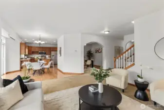 Living area opens to kitchen and dining area