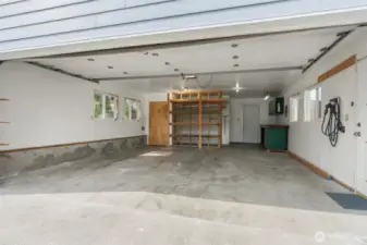 Detached 2-Car Garage has EV charger, plus a loft above!