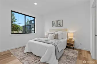 Large primary bedroom with ensuite bath & walk-in closet