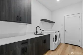 Laundry room complete with washer & dryer