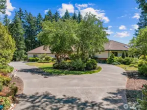 Circular drive provides easy access & abundant parking including RV parking.