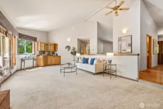 Family room easily accommodates large-scale furniture, & large screen TV