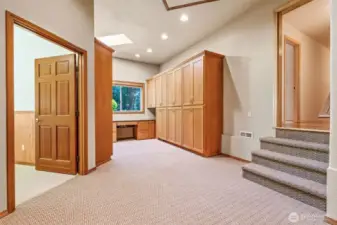 This custom home was designed for a  home-based business.  Adjacent to the garage, this space provides abundant opportunities for nearly any application; 220 amp service connection.