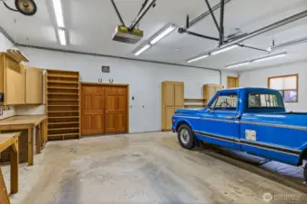 Workbenches, power, plenty of room.  The French doors lead to the office space.