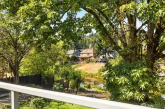 Your personal view from the bedroom offers vibrant treetops and the ever-changing seasons outside. Nature becomes part of your daily backdrop.
