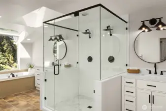 A glass-enclosed shower with rainfall fixtures and custom tile work creates a retreat-like experience. It’s a space that refreshes and rejuvenates.