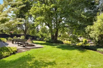 An expansive lawn stretches before you like a private meadow. Perfect for summer picnics, outdoor games, or starlit evenings, it extends the living space outdoors.