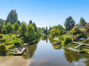A tranquil waterway stretches peacefully from your backyard. Launch a kayak, cast a line, or simply enjoy the stillness of the river.