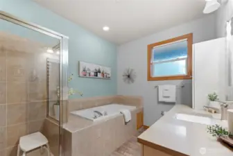 Primary Bathroom with shower and jetted tub.