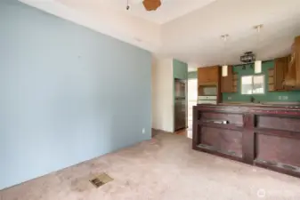 Dining room with ceiling fan.