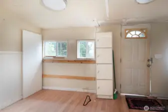 Laundry room with door to back porch.