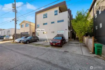 Parking space on the back side of the building with easy access to the unit