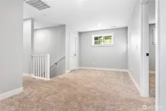 Family Room upstairs.(Mechanical room behind door on left)