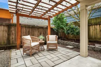 Versatile patio space for relaxing, entertaining, or gardening.