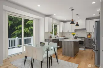 A charming breakfast nook sits just off the kitchen