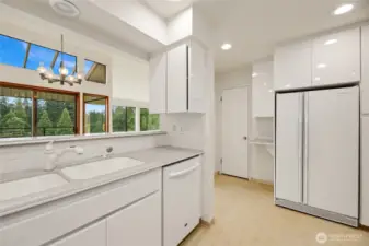 Eating bar open to dining area  Pantry / pocket door to great room