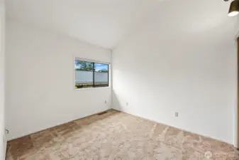 Bedroom #2 with large closet, access to hall bathroom, vaulted ceiling